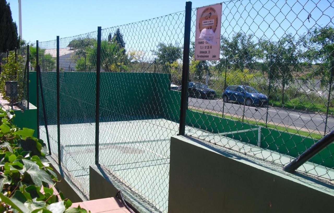 Olhando Um Campo De Golf Islantilla Ngoại thất bức ảnh