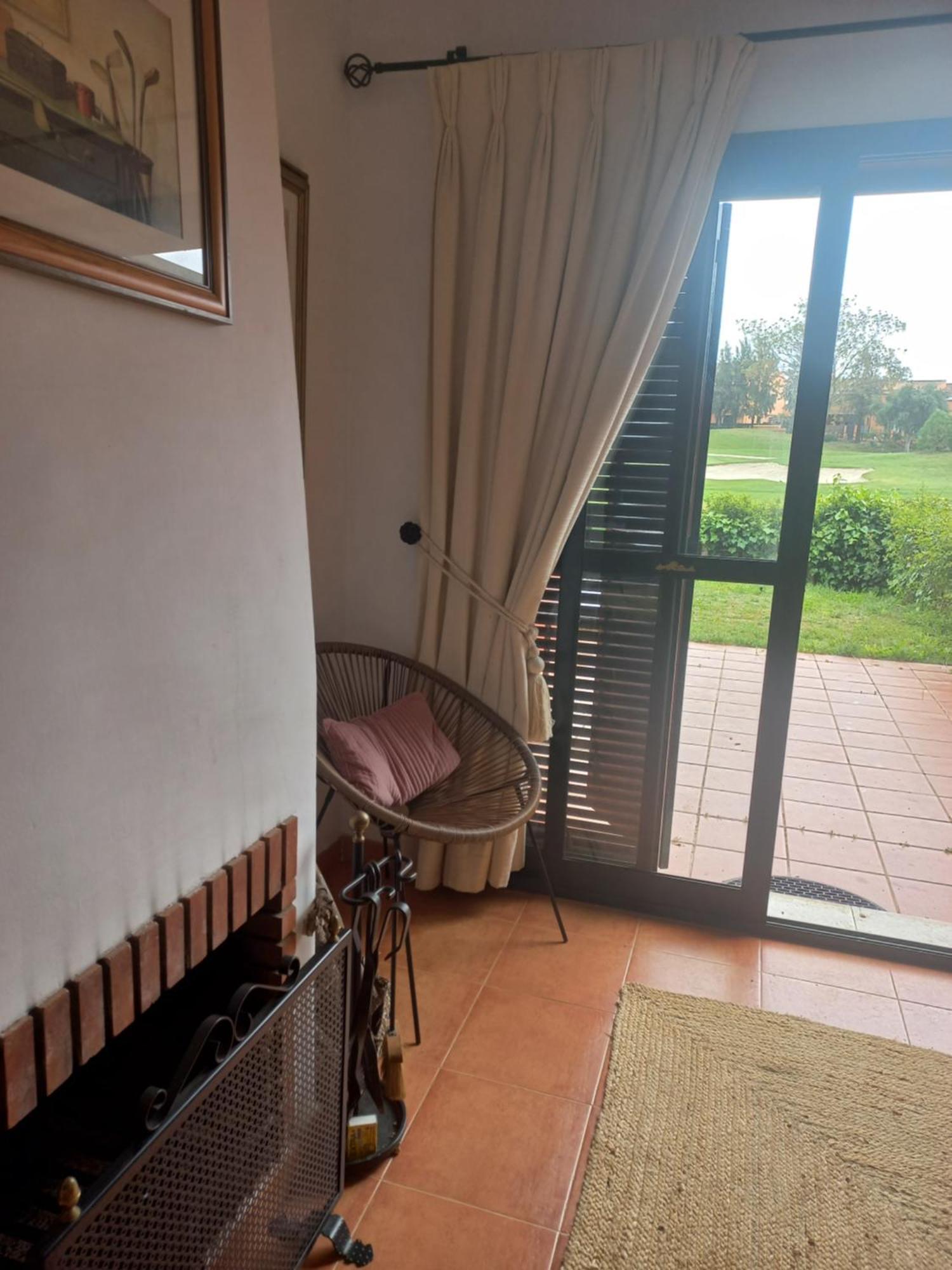 Olhando Um Campo De Golf Islantilla Ngoại thất bức ảnh